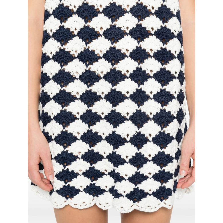 blue and white patterned sleeveless top by Selfnex