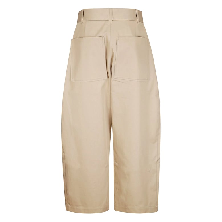 wide leg trousers with patch pockets by Selfnex