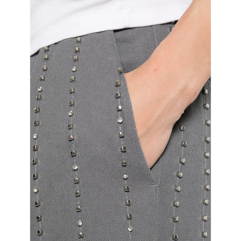 wide leg trousers with dark grey embellishments by Selfnex