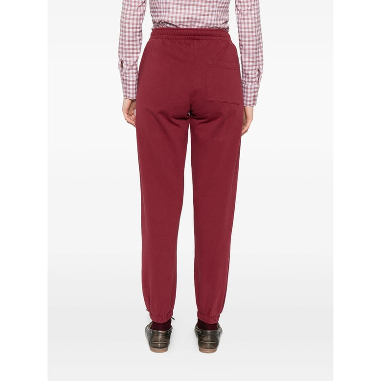 wine red track pants with logo detail by Selfnex