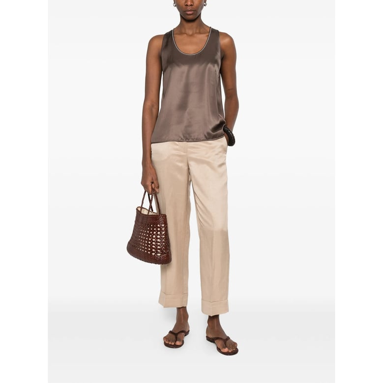 beige cuffed hem trousers by Selfnex