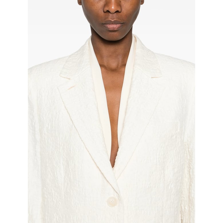 jacket with textured effect and notched lapels by Selfnex