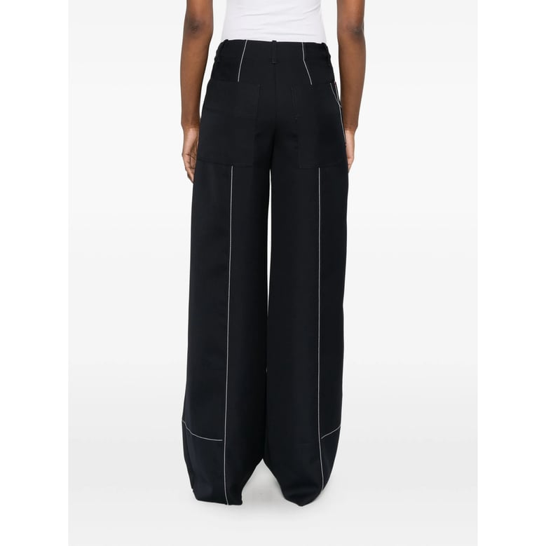 wide leg trousers with patch pockets by Selfnex