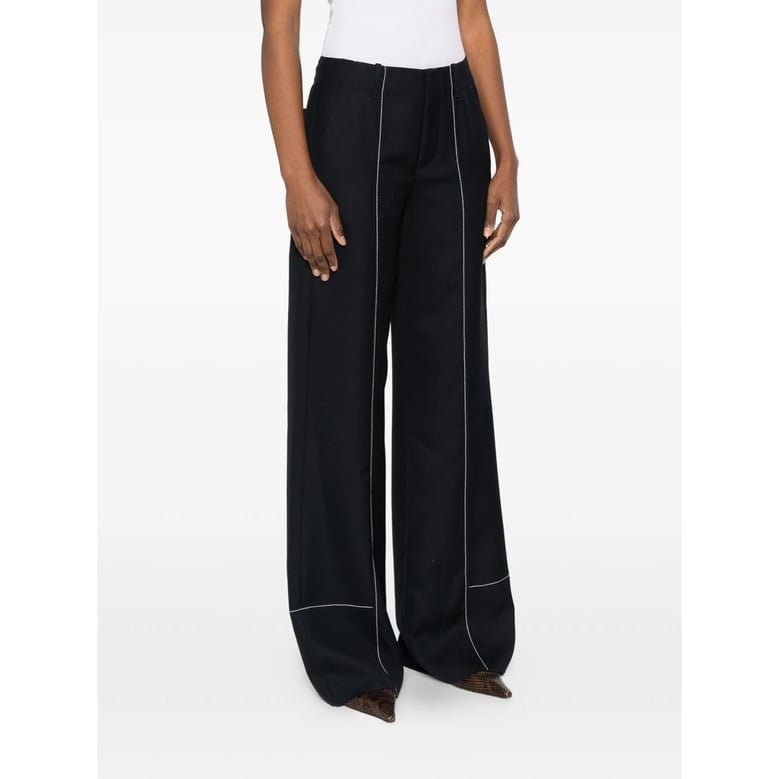 wide leg trousers with patch pockets by Selfnex