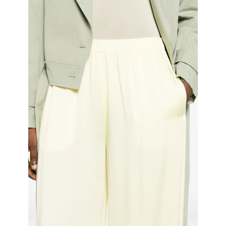 trousers with yellow elastic waistband by Selfnex