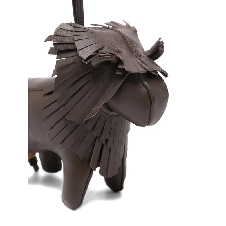 small leather goods with fringed detail by Selfnex