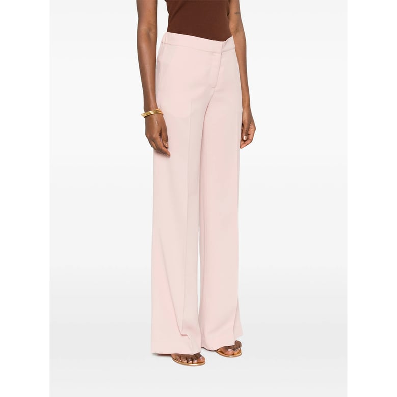 wide leg trousers with slip pockets by Selfnex