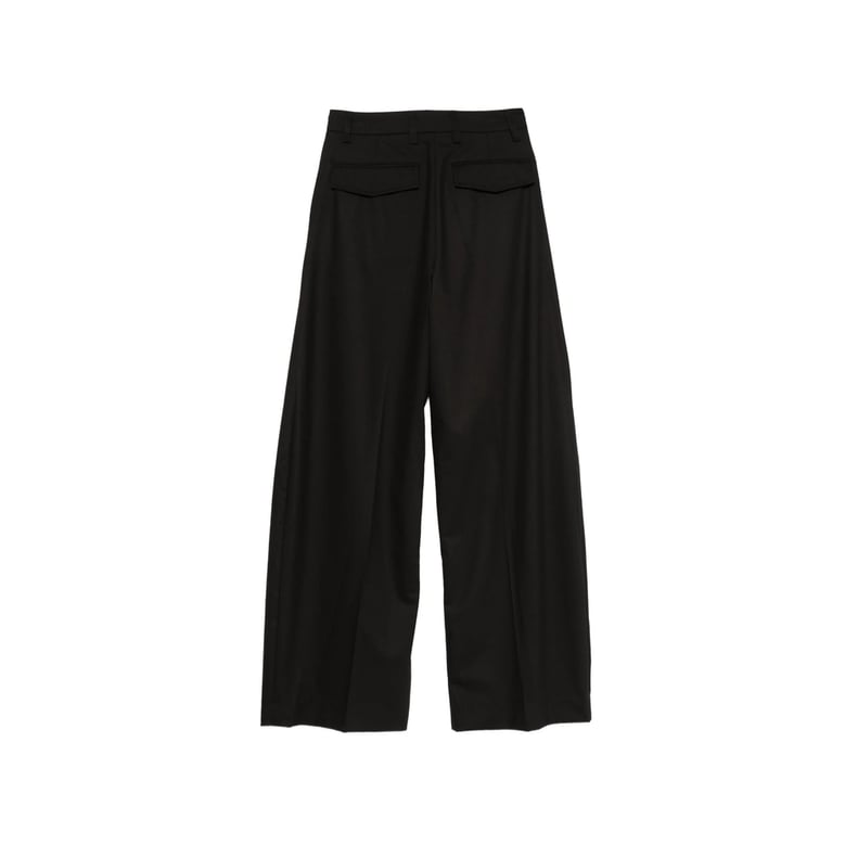 wide leg trousers with flap pockets by Selfnex
