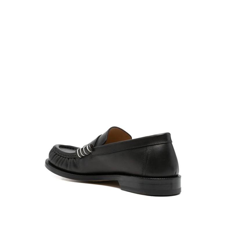 black slip-on low heel shoes by Selfnex
