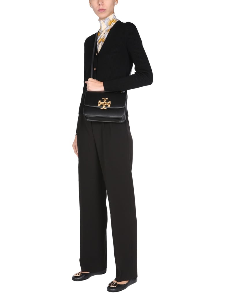 regular fit trousers in black by Selfnex