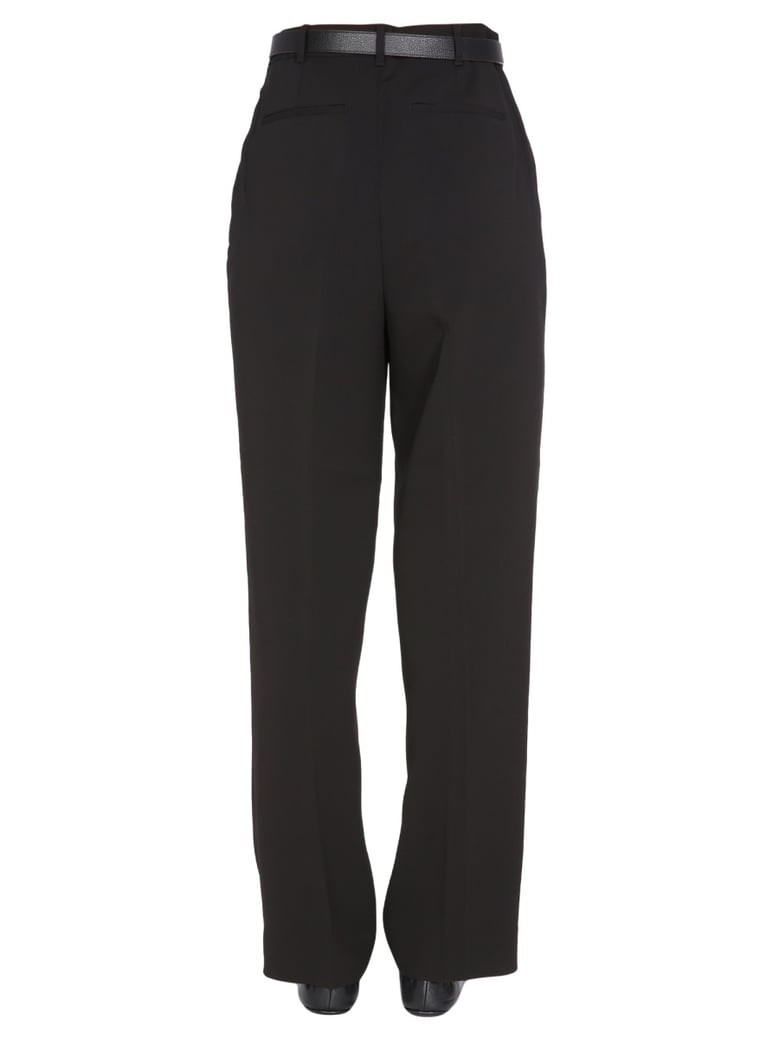 regular fit trousers in black by Selfnex