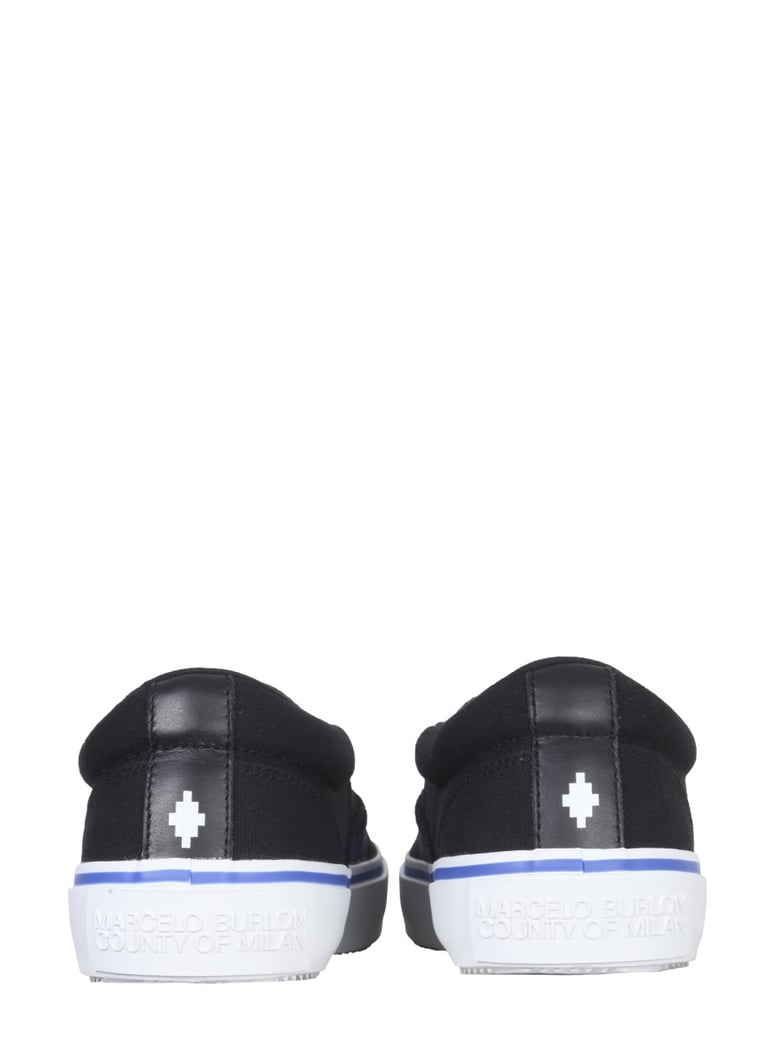 vulcanized slip-ons in black by Selfnex