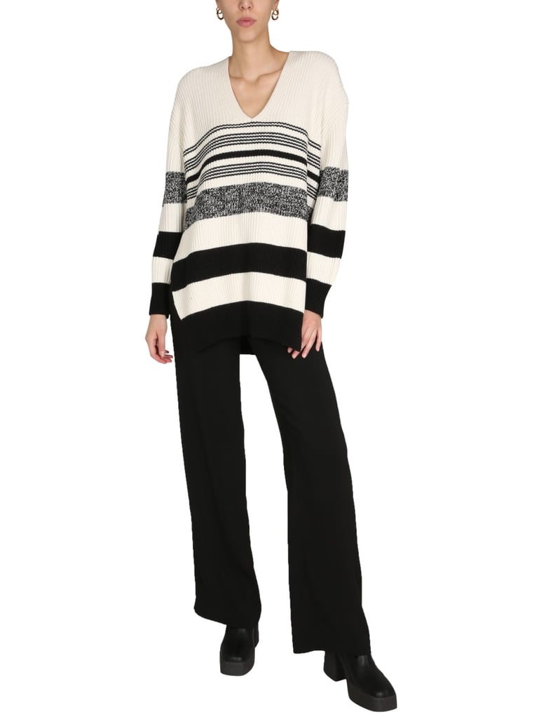 v-neck sweater with side slits by Selfnex