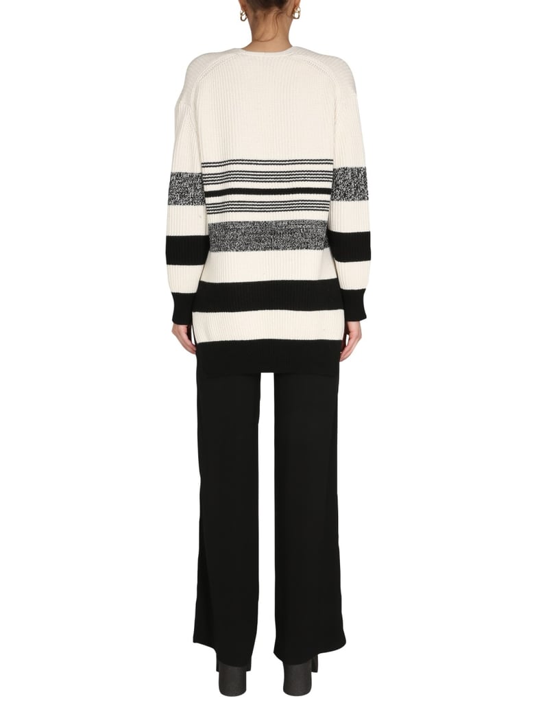v-neck sweater with side slits by Selfnex