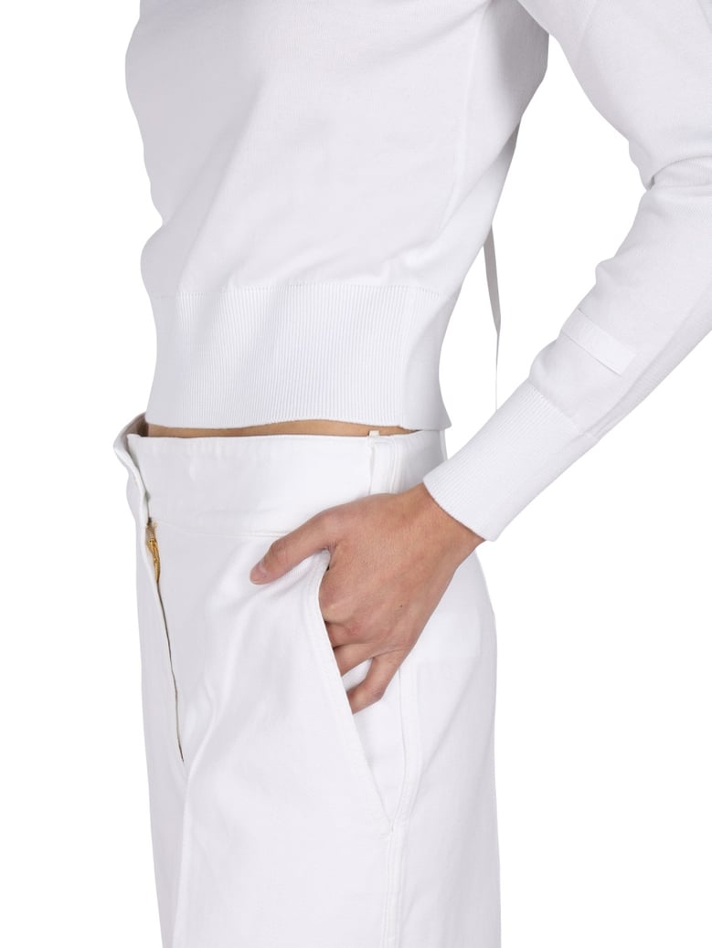 swirl back bow jersey knit top by Selfnex