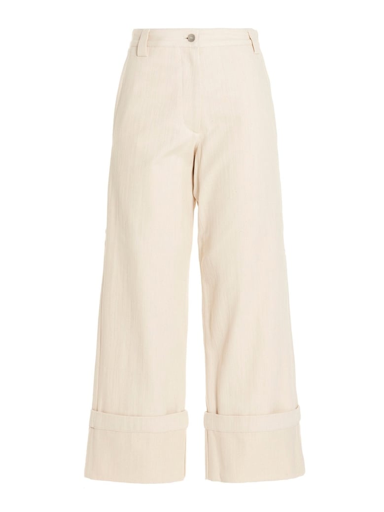 flared pants with zipper closure by Selfnex