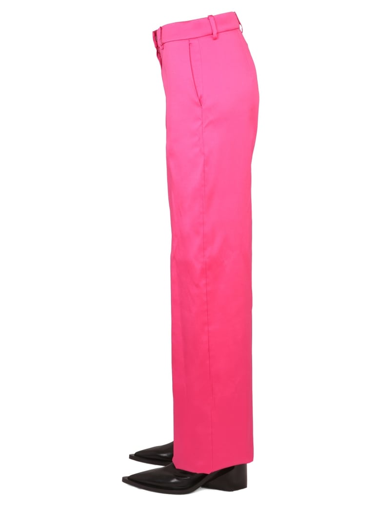 wide leg pants in fuchsia by Selfnex