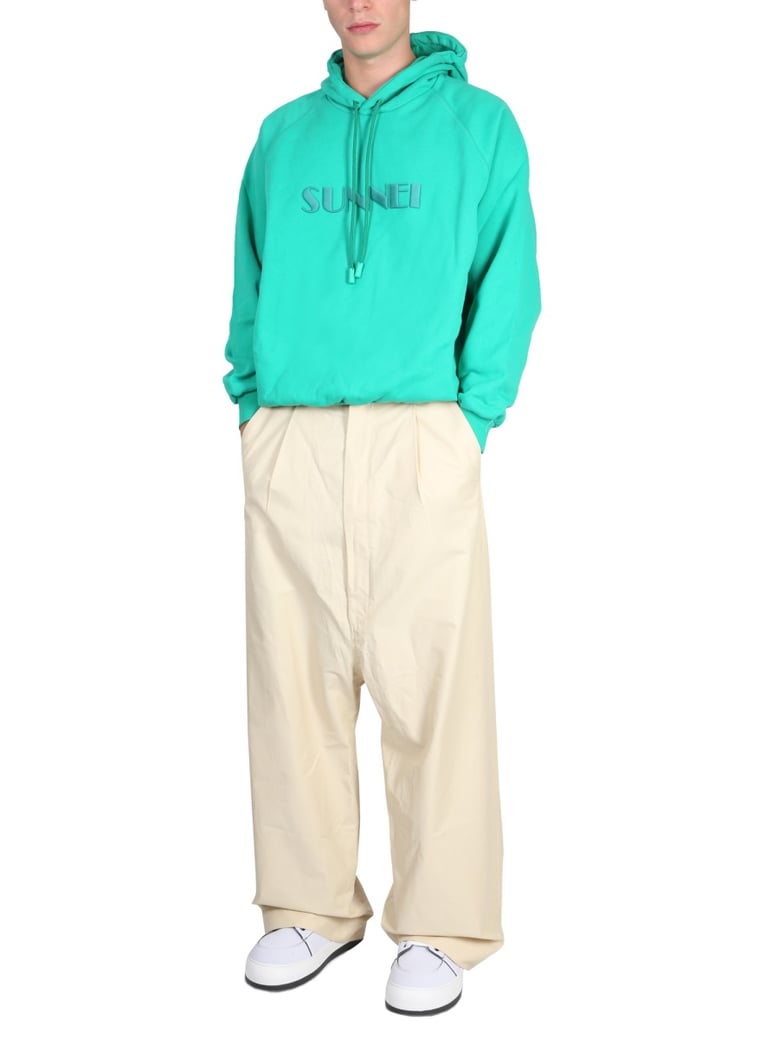 green sweatshirt with logo by Selfnex