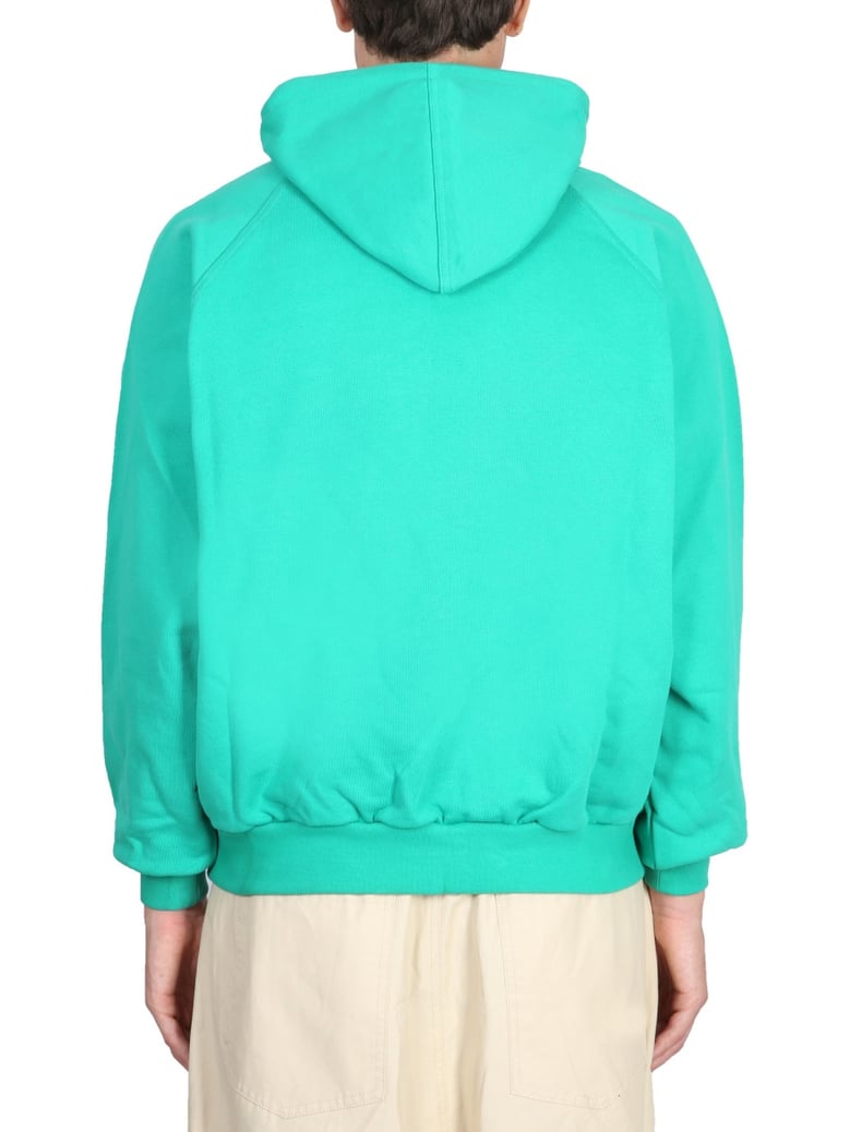 green sweatshirt with logo by Selfnex