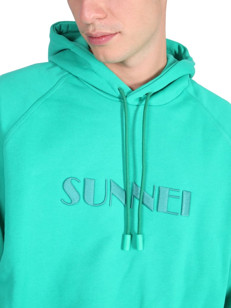 green sweatshirt with logo by Selfnex