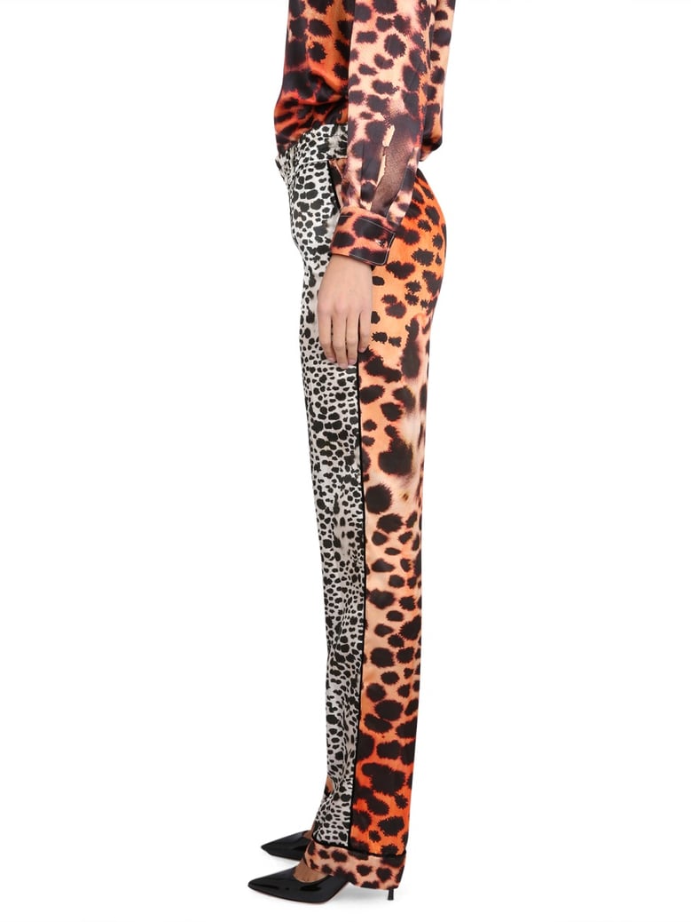 moray eel print pants by Selfnex