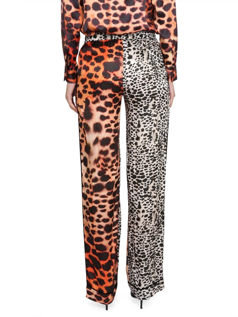 moray eel print pants by Selfnex