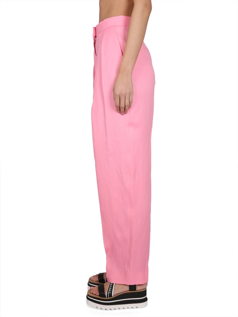 carrot fit pants in pink by Selfnex
