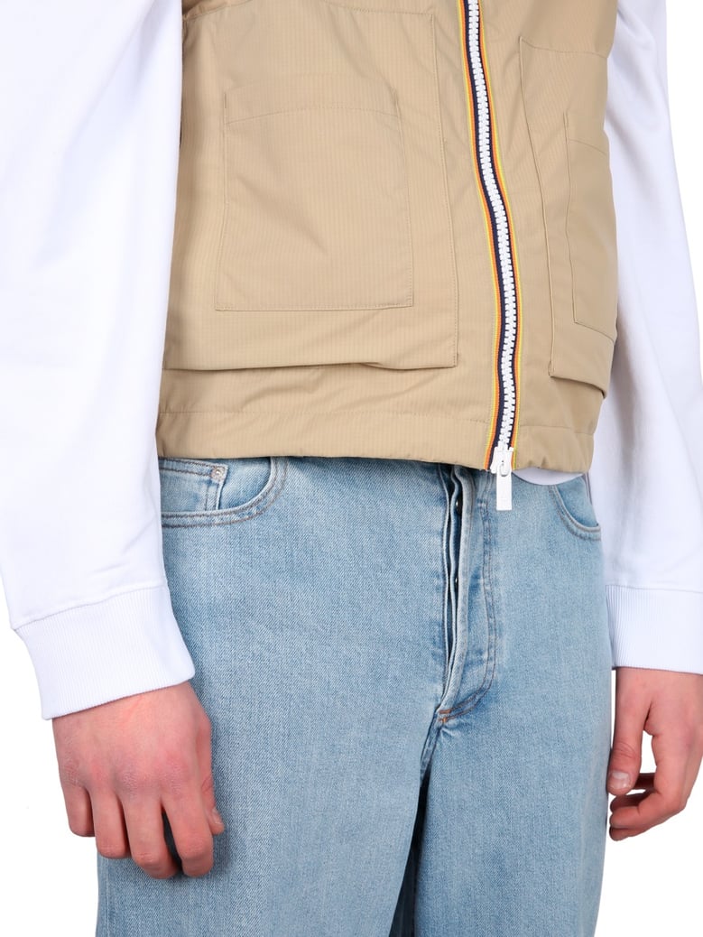 beige v-neck vest with zipper closure by Selfnex