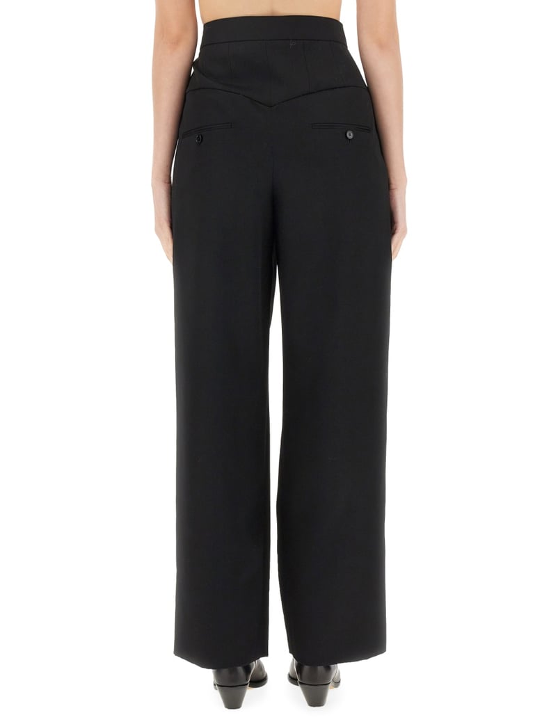 black regular fit wool pants by Selfnex
