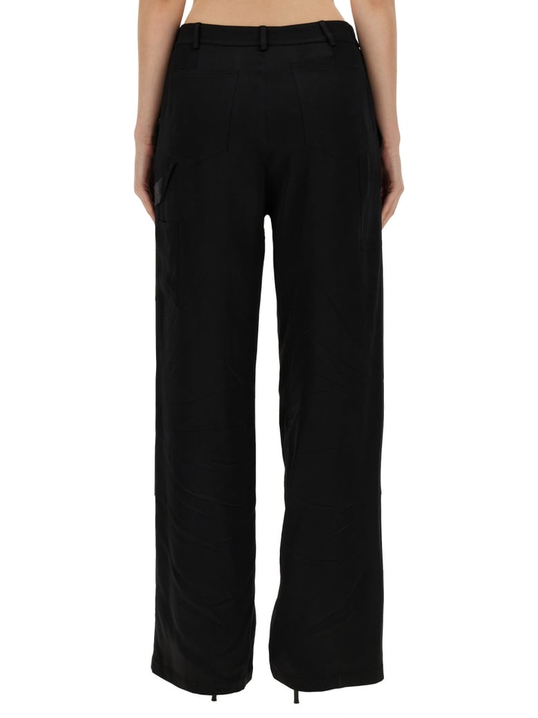 wide leg pants in black by Selfnex