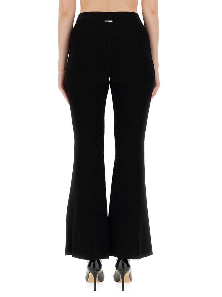 flare leggings in black by Selfnex