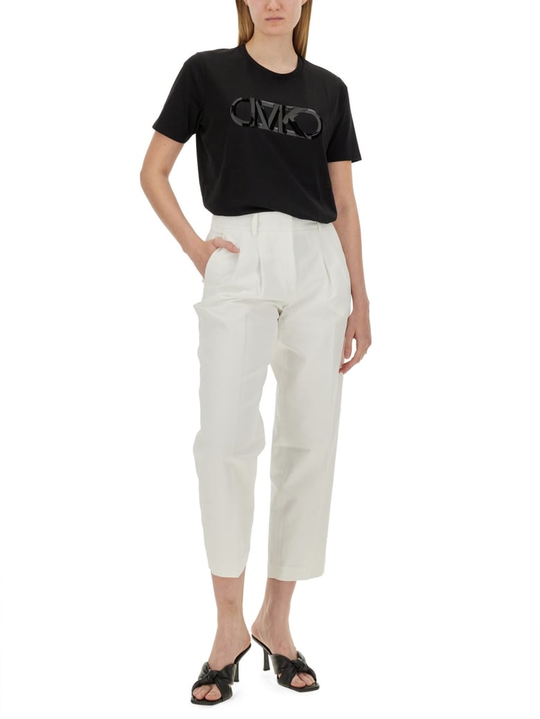cropped pants in white by Selfnex