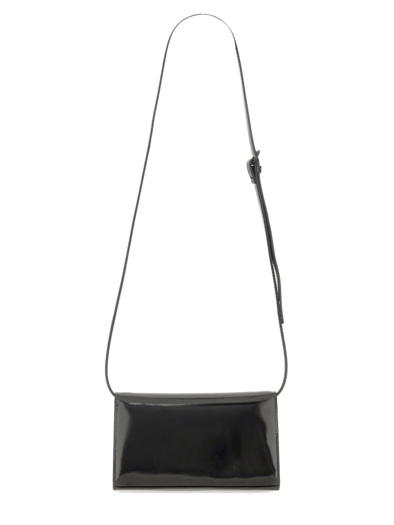 1dr clutch in black by Selfnex