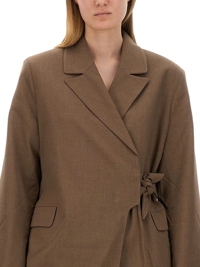 asymmetrical blazer in brown by Selfnex
