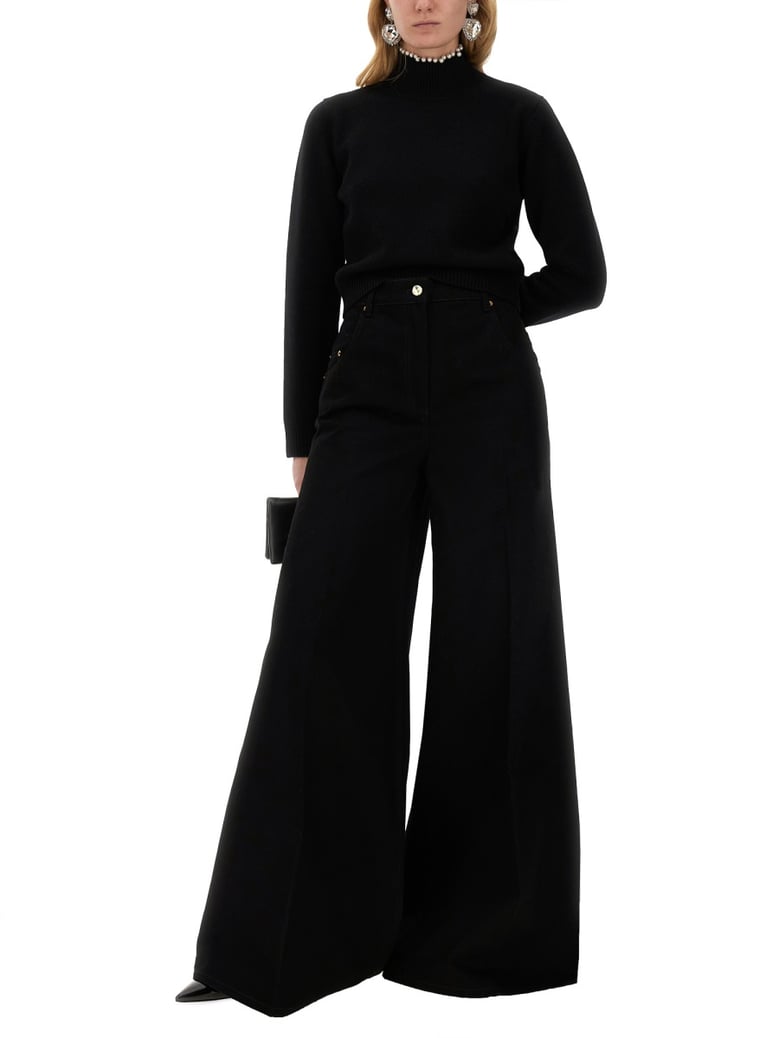 black flared pants by Selfnex