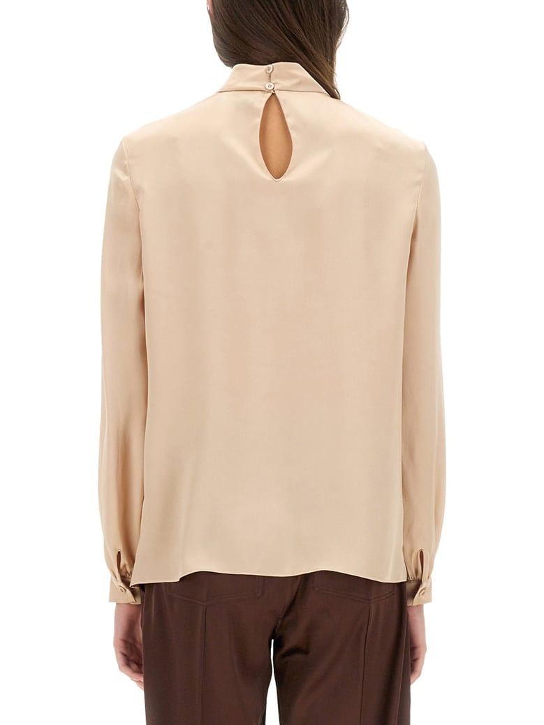 silk shirt in powder blue by Selfnex