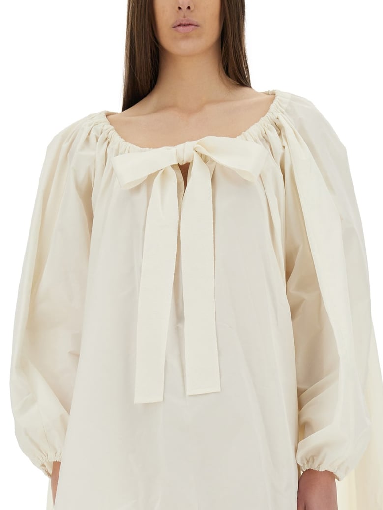 ruffle hem dress by Selfnex