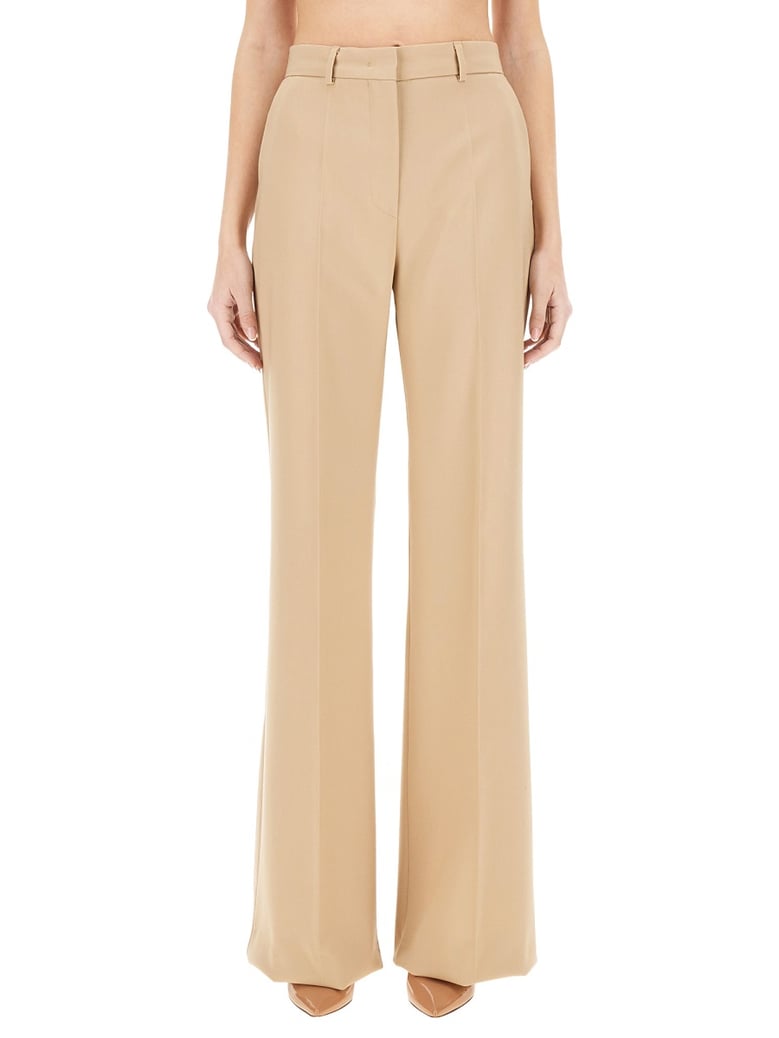 beige virgin wool pants by Selfnex