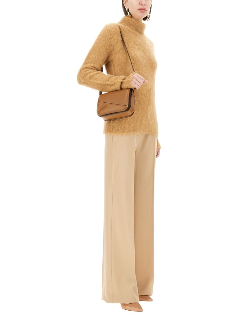 beige virgin wool pants by Selfnex