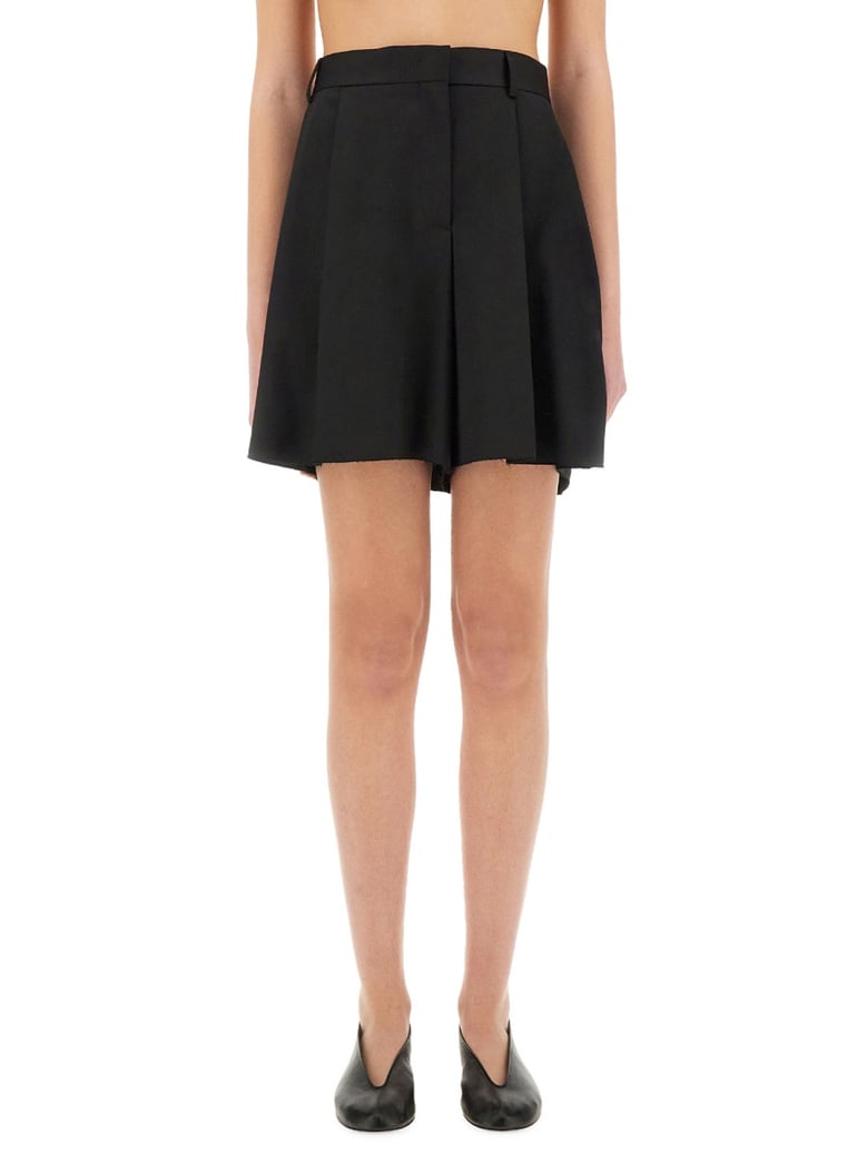 asymmetrical wool shorts by Selfnex