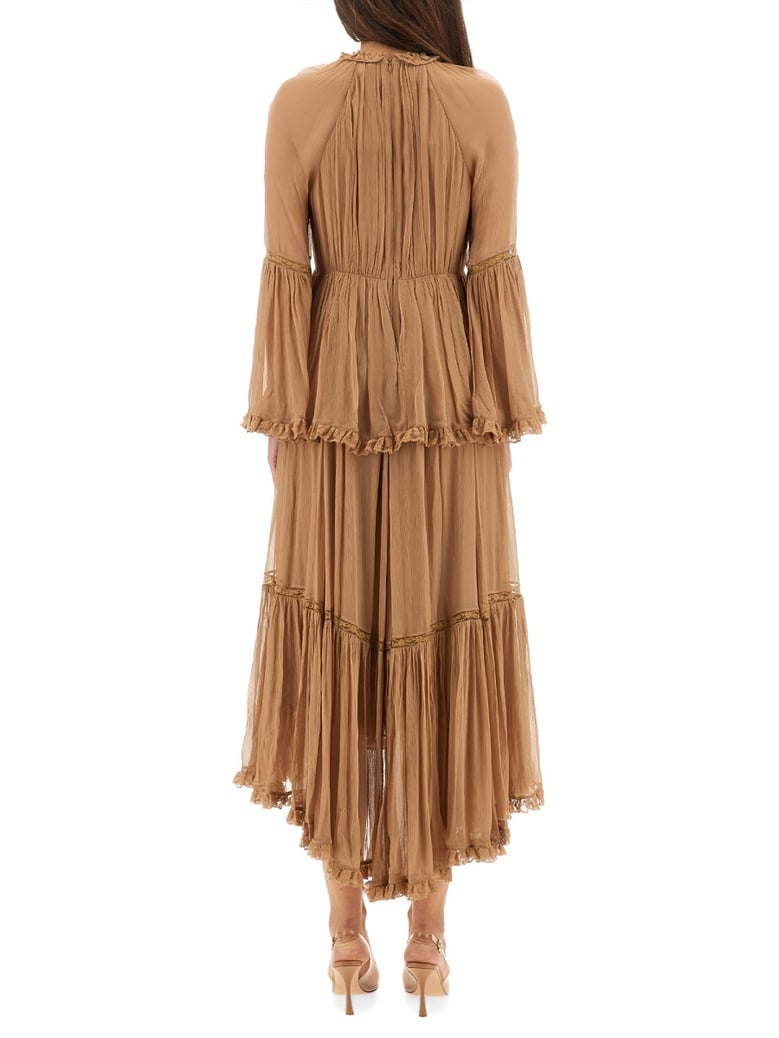 hypnotic peplum ruffle dress by Selfnex