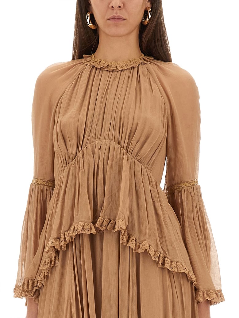 hypnotic peplum ruffle dress by Selfnex