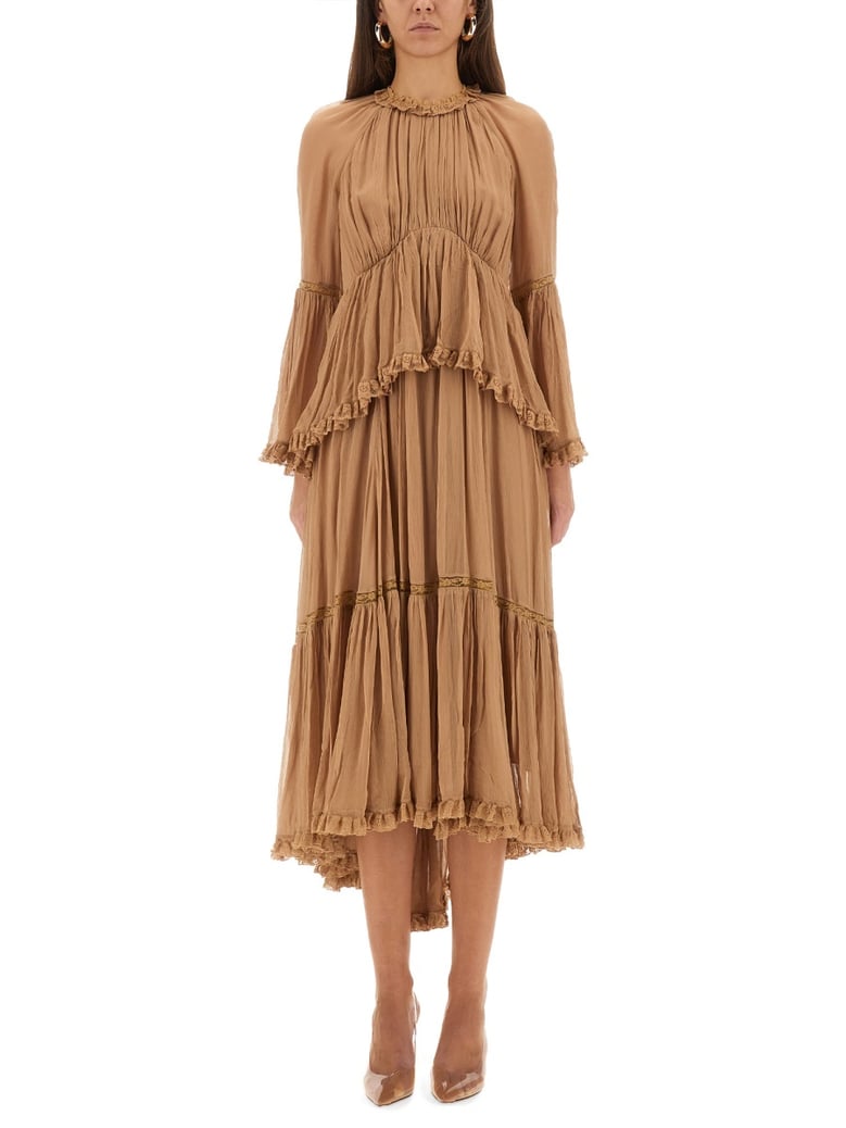 hypnotic peplum ruffle dress by Selfnex