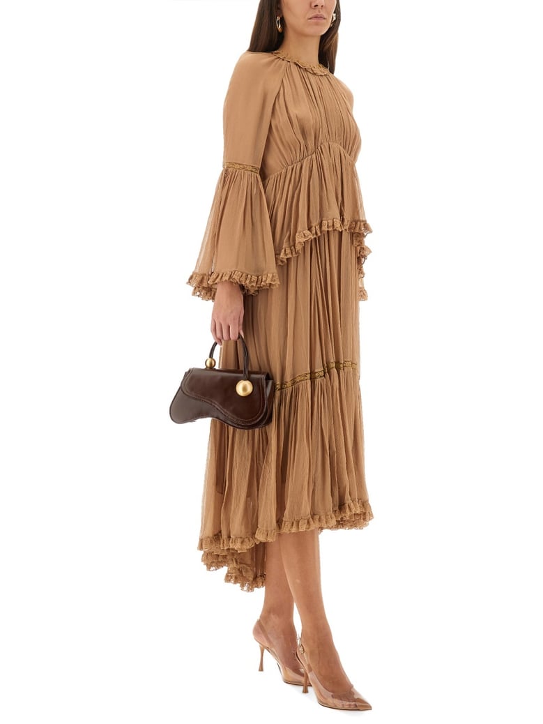 hypnotic peplum ruffle dress by Selfnex