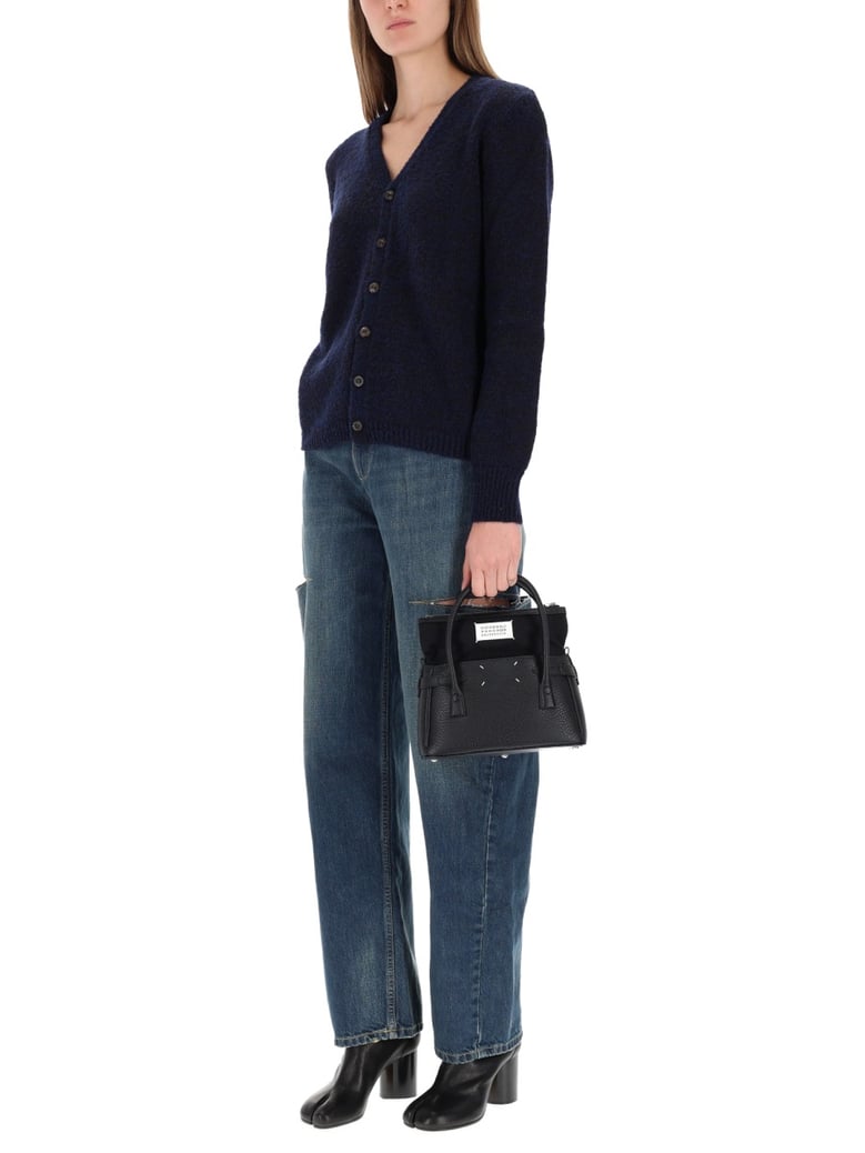wool cardigan in blue by Selfnex