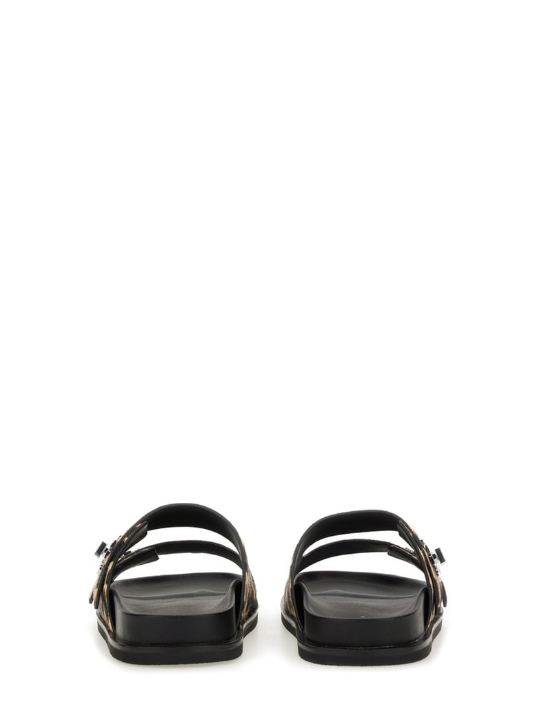 black leather sandals with t lock by Selfnex