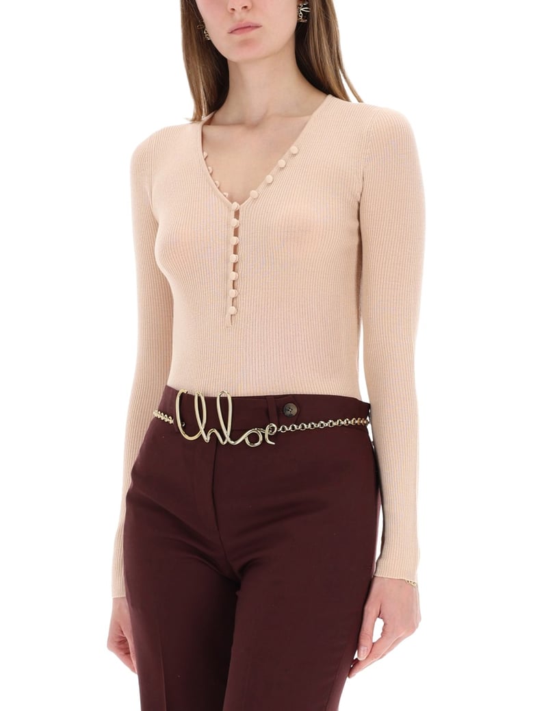 ribbed knit top with buttons by Selfnex