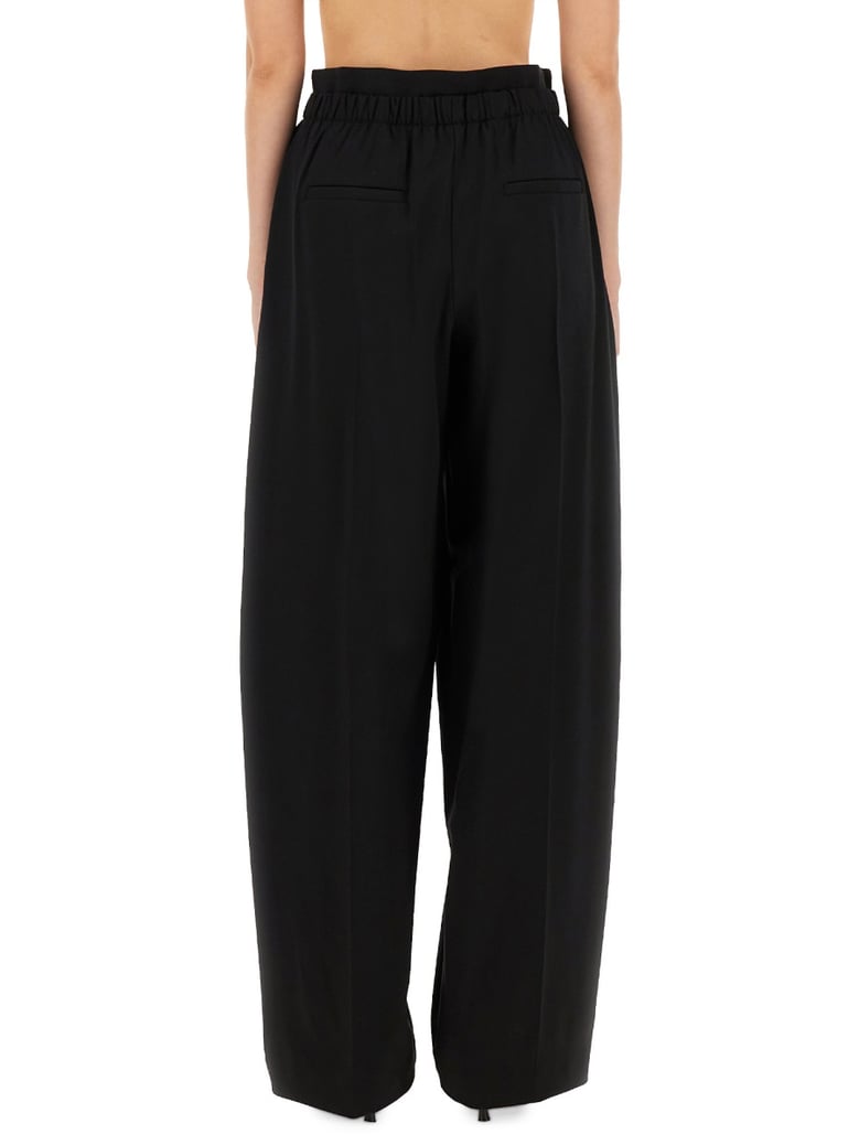 wide leg pants in black by Selfnex
