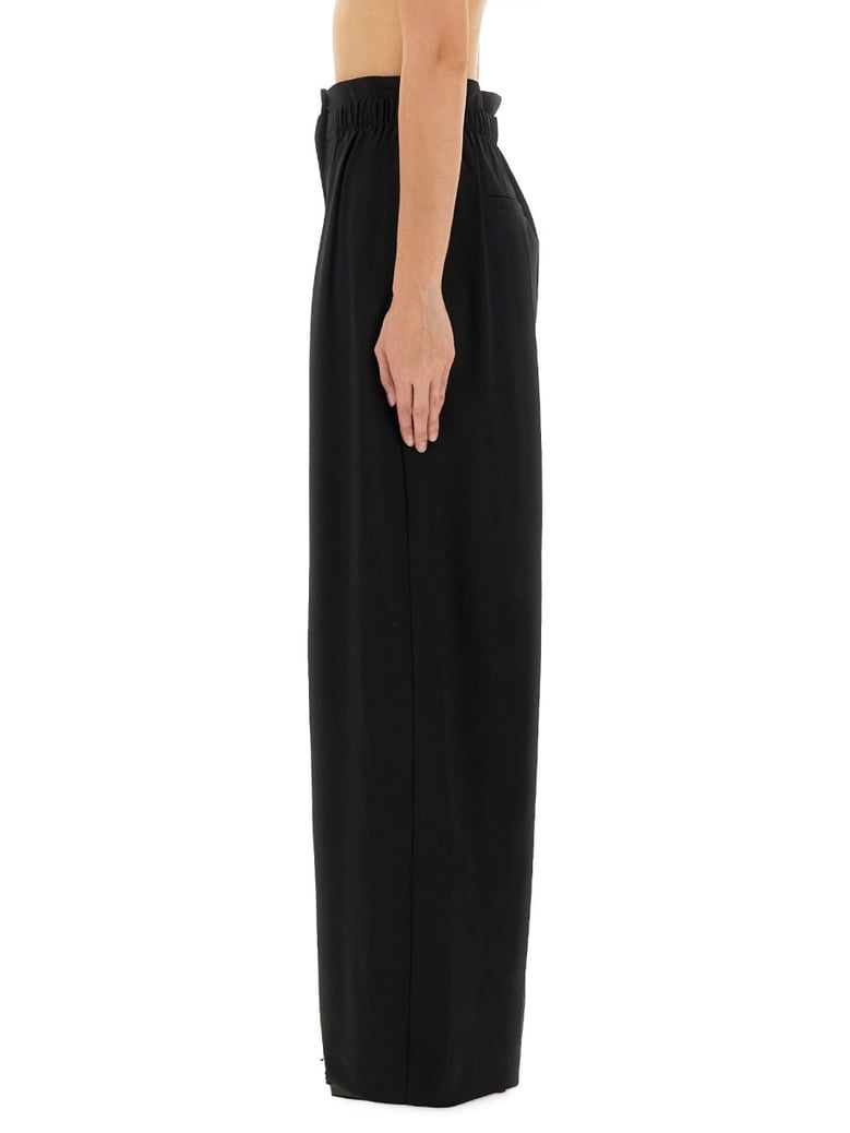 wide leg pants in black by Selfnex