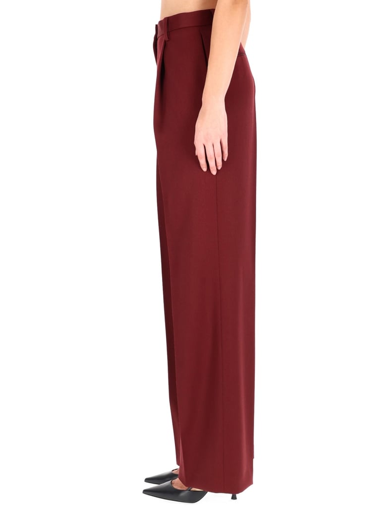 wool trousers in bordeaux by Selfnex